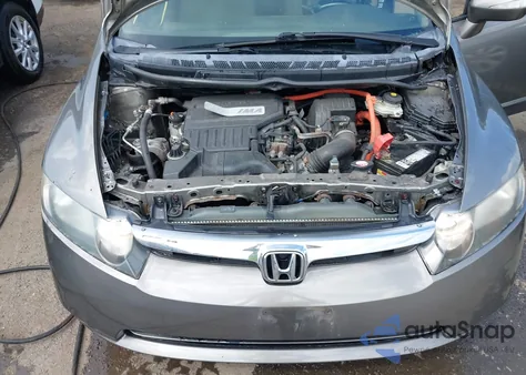 2007 Honda Civic Hybrid from USA, damaged, VIN JHMFA362X7S031612
